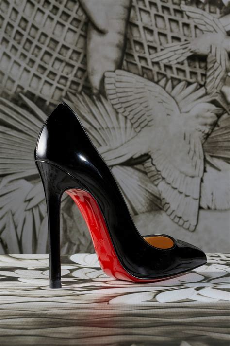 why are louboutin shoes red.